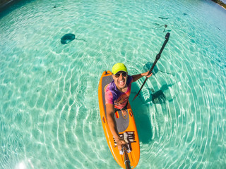 Stand up paddle in Bora Bora Island, French Polynesia.