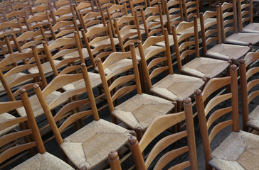 wooden chairs with straw seat before the show