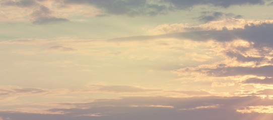 Panorama of Sky background or texture at the sunset time with clouds. Copy space. Instagram