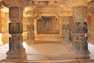 Decorative pillars from black basalt in mandappa or Hall. Hazara Rama Temple Hampi, Karnataka....