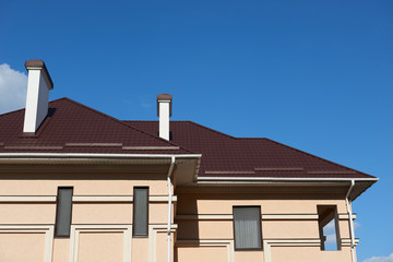 roof of a private house with a chimney