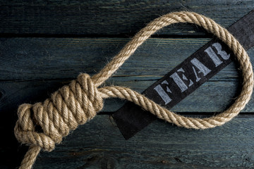 Hangman noose with letter of suicide anxious person