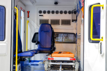 Inside an ambulance with medical equipment for helping patients before delivery to the hospital.   © CHIRADECH
