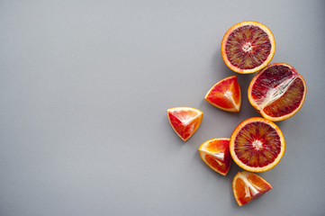 Blood orange on purple background.