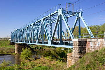 Construction of a metal railway bridge
