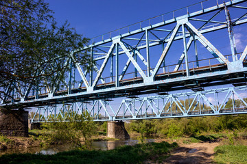 Construction of a metal railway bridge
