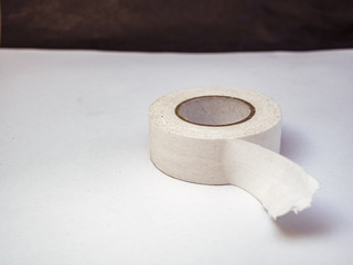 white insulating tape isolated on the table close up.
