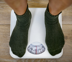 Woman on a weight scale