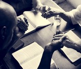 Group of people holding hands praying worship believe