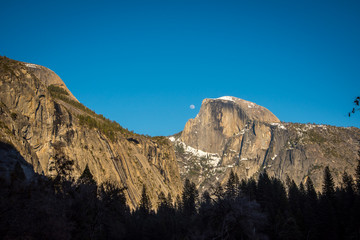 moon near half dome at yosemite 