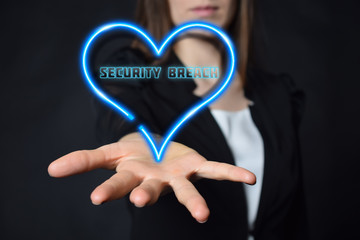 A businessman shows an inscription:SECURITY BREACH