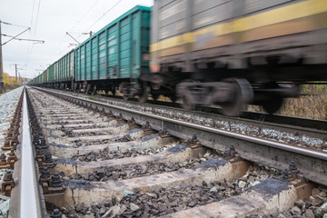 Obraz premium Railway road and trees in yellow colors