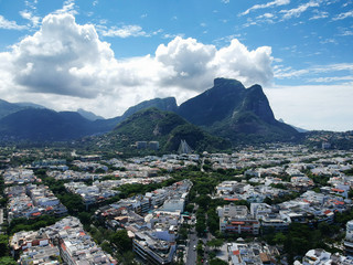 Obraz premium Drone view of Jardim Oceanico region in Barra da Tijuca,Gavea Stone hill, Rio de Janeiro