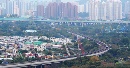 Naklejka premium Train passing by in Hong Kong