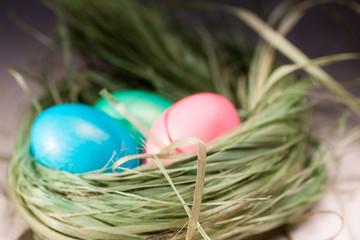 Colorful easter eggs in basket a