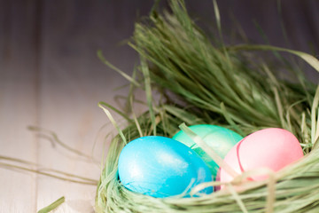 Colorful easter eggs in basket a