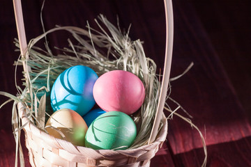 Colorful easter eggs in basket a