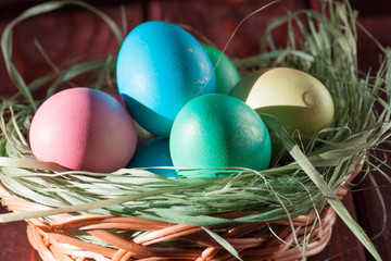 Colorful easter eggs in basket a