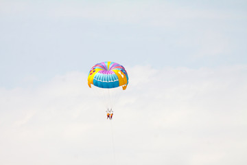 Parasailing in a blue sky