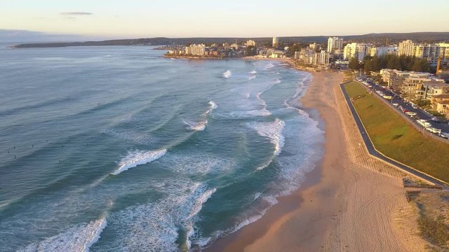 Aerial flight above Cronulla Beach, Sydney in the morning.