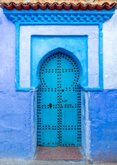 Old blue door on street in Chefchaouen