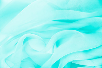 Texture chiffon fabric blue color for backgrounds 