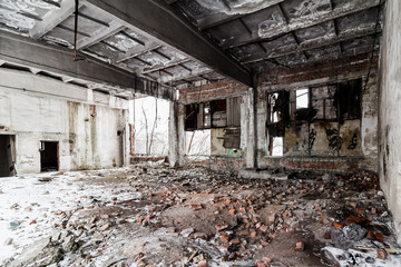 Fototapeta na wymiar Interior of abandoned dilapidated building