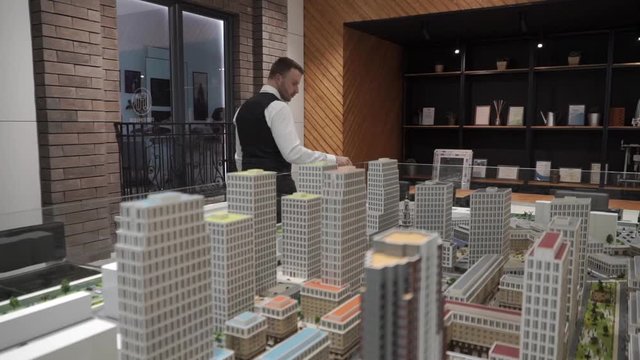 Man is walking around the layout