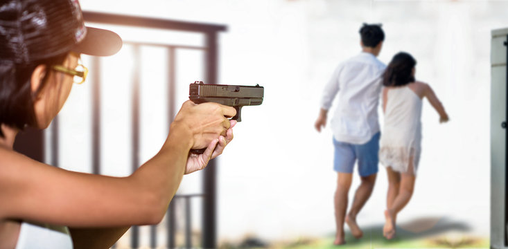shot gun in hand of wife tries to fire shooting on her husband running away with other woman mistress or concubine, CONCEPT family trouble