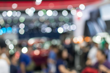 Abstract blurred image of crowd people in exhibition show