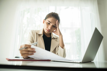 Young business people are suffering from headaches