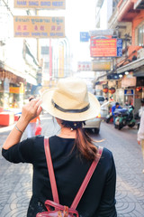 Asian tourist women travel in Yaowarat Chinese road for shopping