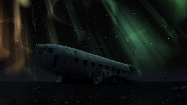 Crashed DC-3 Plane aurora borealis Solheimasandur winter sky tourism night timelapse