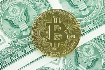 Cryptocurrency Golden Bitcoin. USA Dollars banknotes background