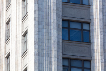 Fototapeta na wymiar Windows in the building as a background
