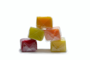  Colored chewing sweets on white background