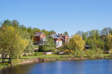 Fototapeta na wymiar Houses on the river bank in Pskov