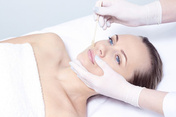 Cosmetic procedure for hair removal. Bright skin. Beauty and health