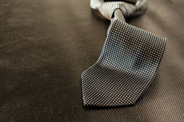 tie on dark background