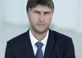 Portrait of a smiling successful businessman.