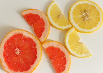 cut grapefruit and lemon