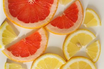 cut grapefruit and lemon