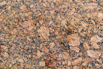 Red granite slab. Texture of natural stone