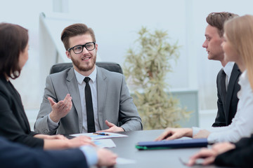 businessman at a meeting with employees