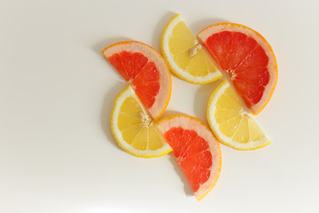 cut grapefruit and lemon