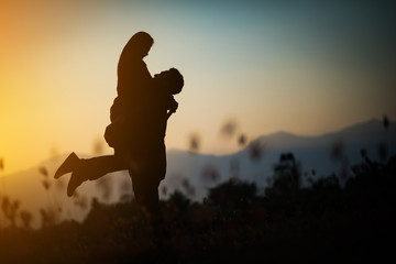 silhouette of Couple in love silhouette during sunset