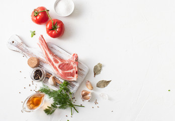 Meat with spices for barbecue marinade on white