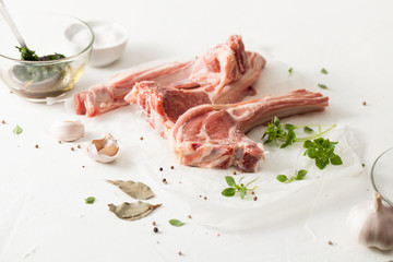 Cooking meat marinade on kitchen white table