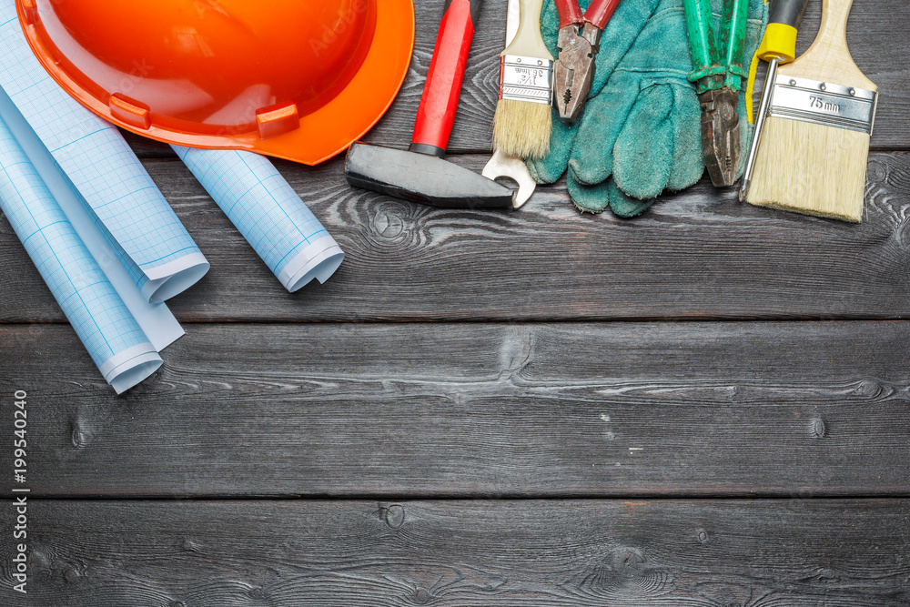 Wall mural assorted work tools on wooden table