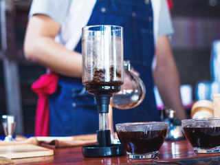 Makeing prepares coffee